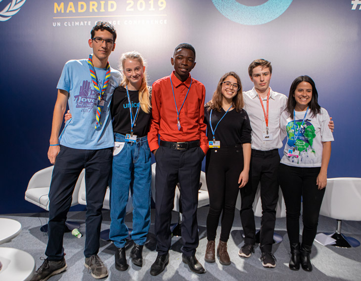 Imagen de jóvenes activistas en una conferencia de UNICEF en Madrid