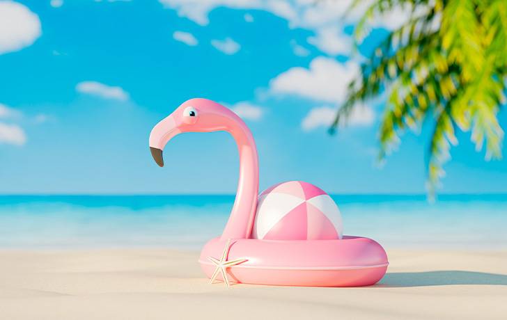 Ilustración 3D de unos juguetes en la playa